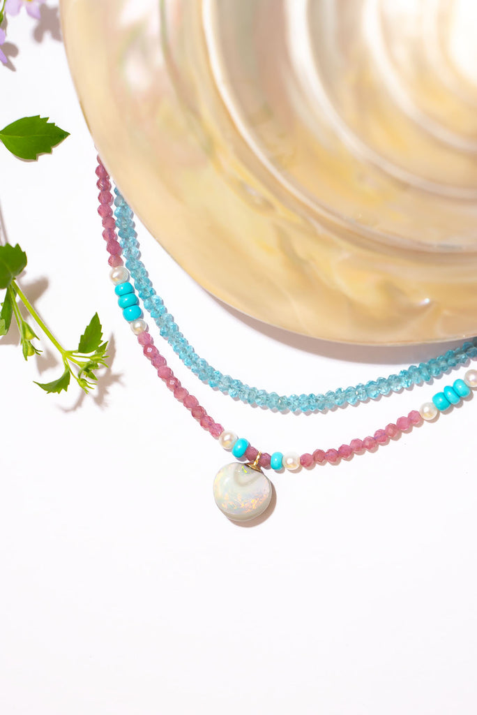 A delightful Spring Summer coloured creation. This delicate piece features a gorgeous Lightning Ridge opal pendant.