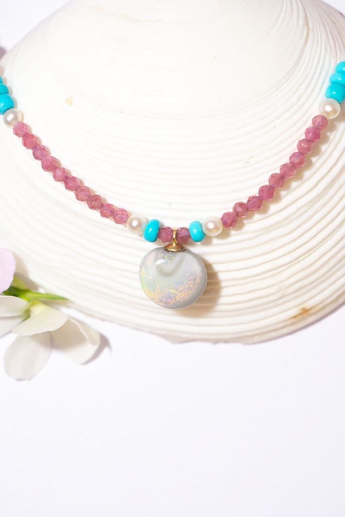 A delightful Spring Summer coloured creation. This delicate piece features a gorgeous Lightning Ridge opal pendant.
