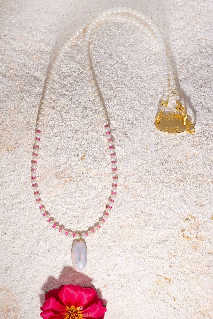 This delicate pearl, opal & spinel necklace is an enchanting piece.
