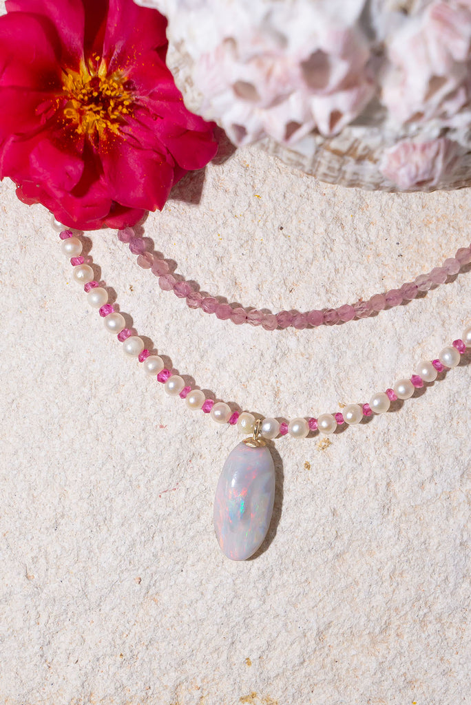 This delicate pearl, opal & spinel necklace is an enchanting piece.