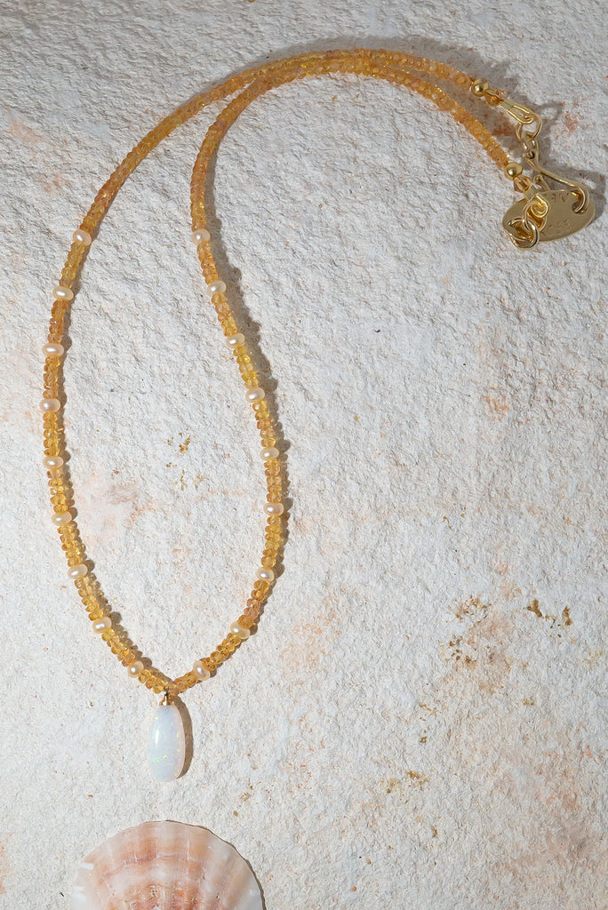 Gorgeous and glowing this beautiful opal & gemstone necklace sings of happy Summer days.