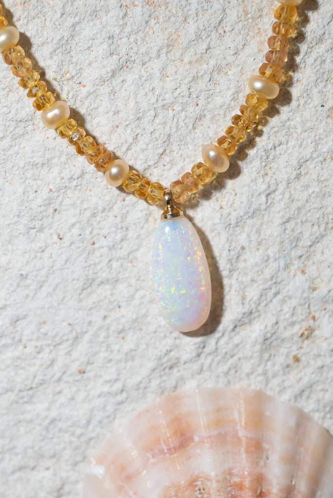 Gorgeous and glowing this beautiful opal & gemstone necklace sings of happy Summer days.
