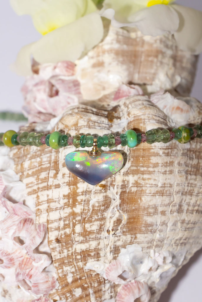 Fall in love with our delicate Necklace Gemstone Woodland Opal an enchanting piece with a magical opal heart pendant.