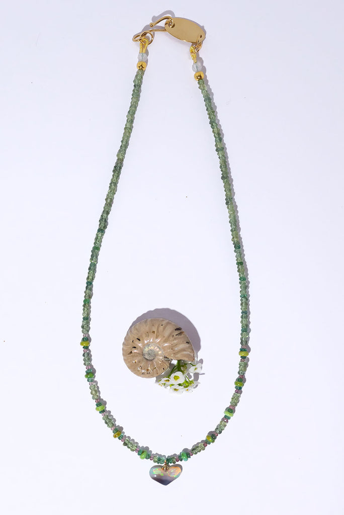 Fall in love with our delicate Necklace Gemstone Woodland Opal an enchanting piece with a magical opal heart pendant.