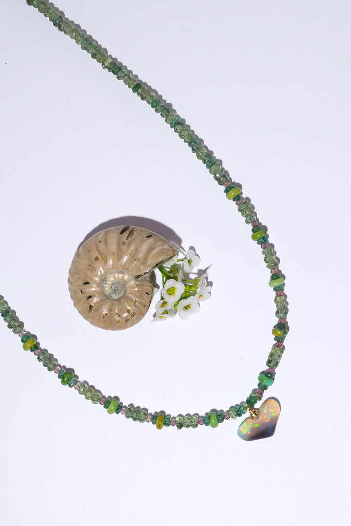 Fall in love with our delicate Necklace Gemstone Woodland Opal an enchanting piece with a magical opal heart pendant.