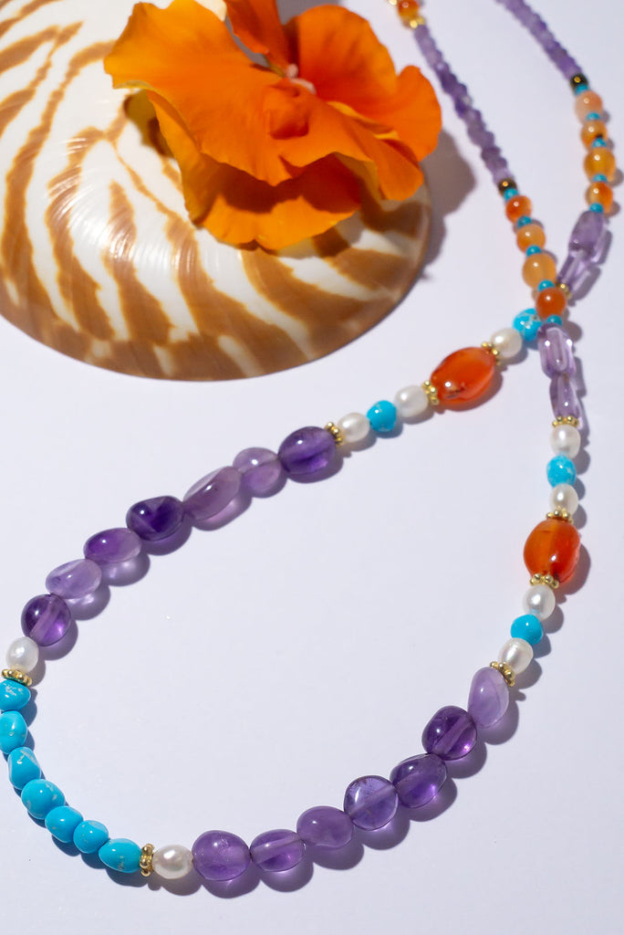 Be the happiest person in the room, our Inez gemstone necklaces bring a joyous tumble of colourful gemmy stones.