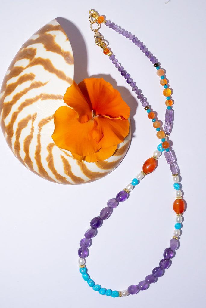 Be the happiest person in the room, our Inez gemstone necklaces bring a joyous tumble of colourful gemmy stones.