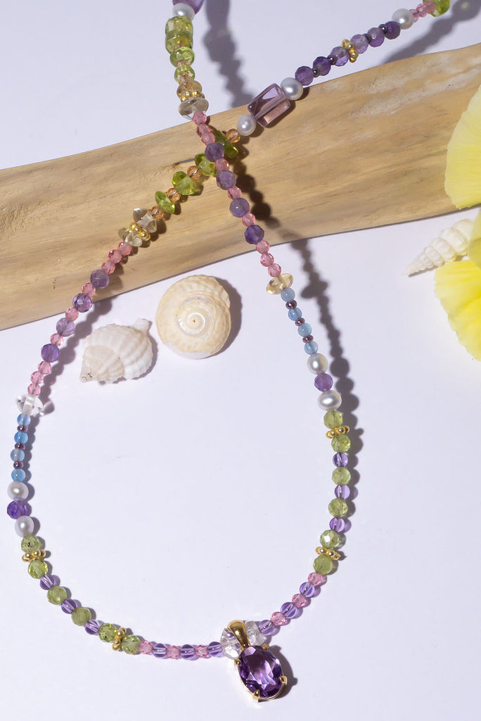 So romantic, this delicate softly coloured necklace has a perfect faceted Amethyst stone as a centrepiece it's set between a modern chic and classic romantic style.&nbsp;