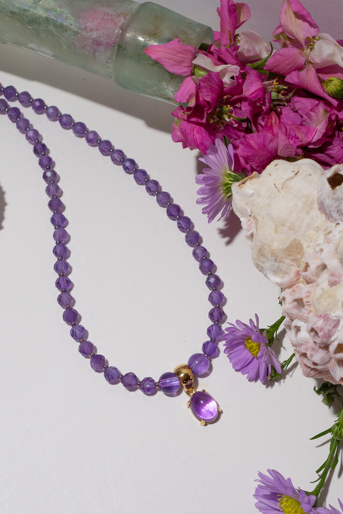 A romantic Amethyst necklace, with the perfect faceted stone as a centrepiece it is perfectly set between a modern chic and classic romantic style