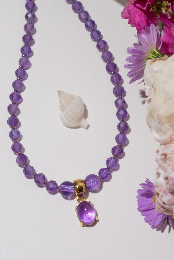 A romantic Amethyst necklace, with the perfect faceted stone as a centrepiece it is perfectly set between a modern chic and classic romantic style