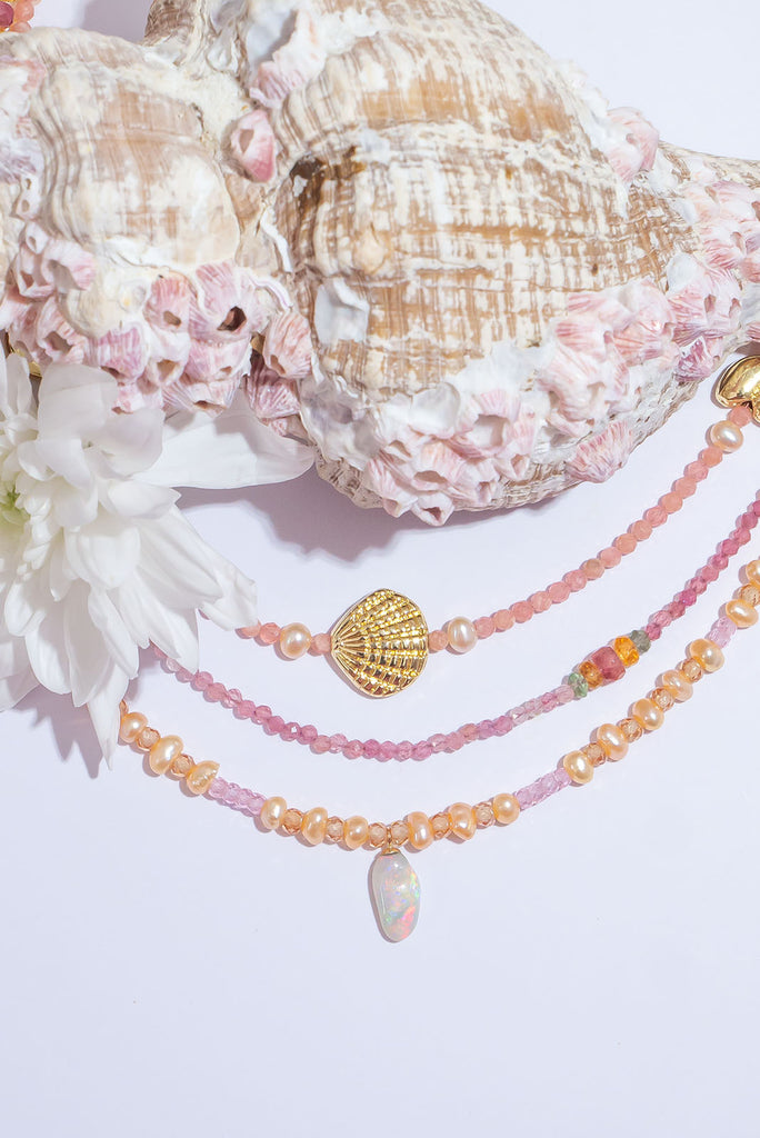 The palest peachy pink pearls and a tiny drop of crystal Opal, this darling necklace is so feminine and utterly adorable.