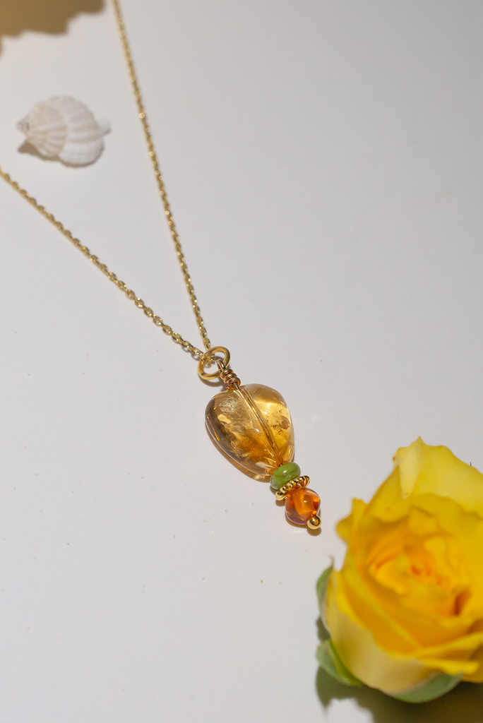 Exude timeless elegance with of citrine, Sonoran gold and baltic amber.