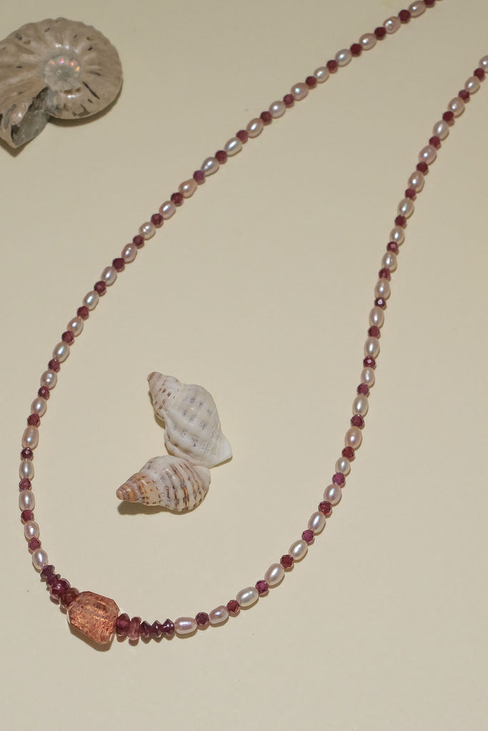Soft rosewood hued garnets and the palest of pink pearls. Fall in love with our delicate Necklace Rosewood Romance.