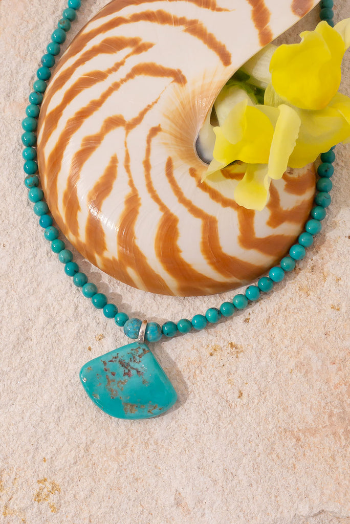 Like the clears waters of a beach in the Pacific Ocean this beautiful natural turquoise necklace is cool & bright.