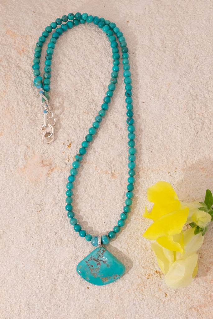 Like the clears waters of a beach in the Pacific Ocean this beautiful natural turquoise necklace is cool & bright.