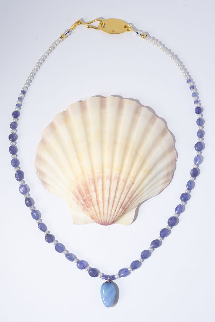 Fall under the spell of this enchanting periwinkle blue creation.