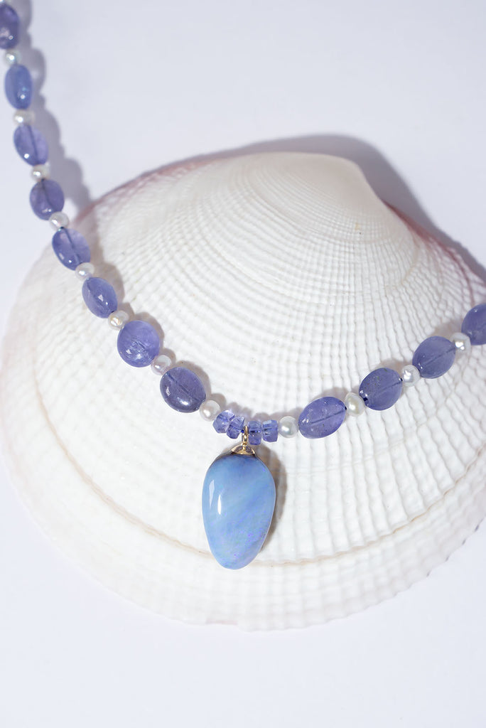 Fall under the spell of this enchanting periwinkle blue creation.