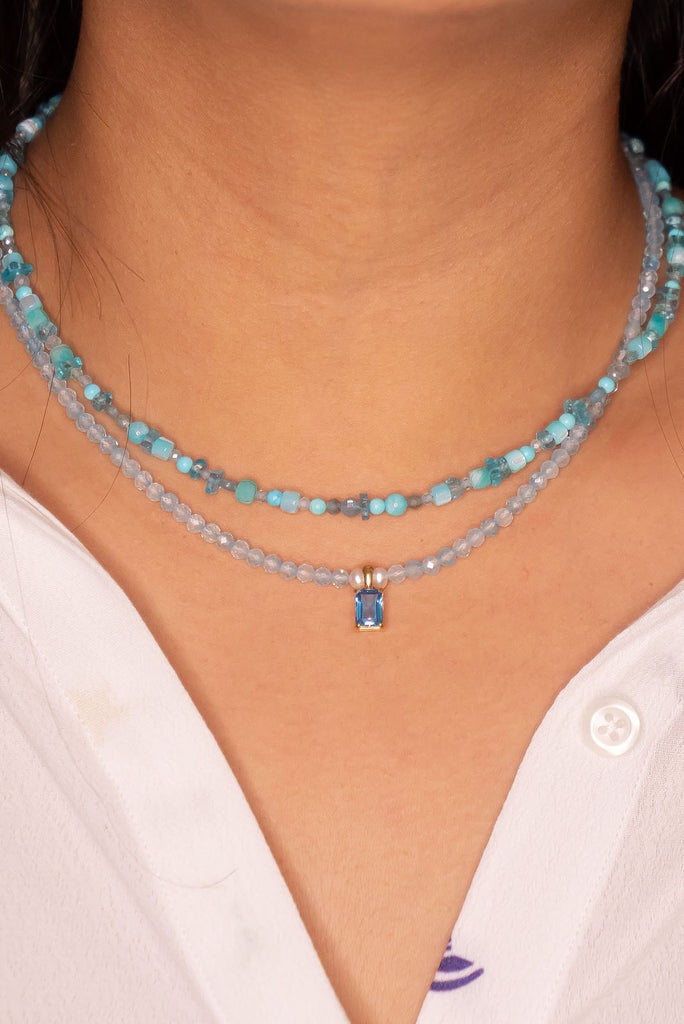 As beautiful as a clear blue sky day, this blue Topaz necklace with the perfect faceted stone as a centrepiece is perfectly set between a modern chic and crystal dreaming.