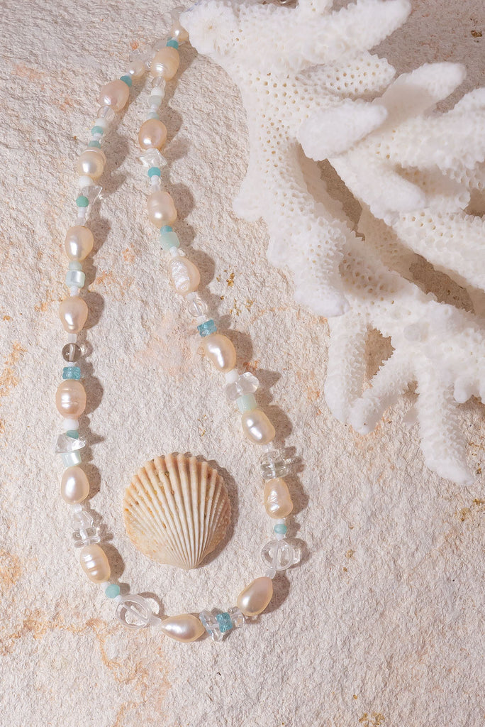 Tiny aqua drops on a tropical island lagoon, luminescent creamy white pearls with wave drops of palest blue Aquamarine and Amazonite beads, feel the calm of the islands.