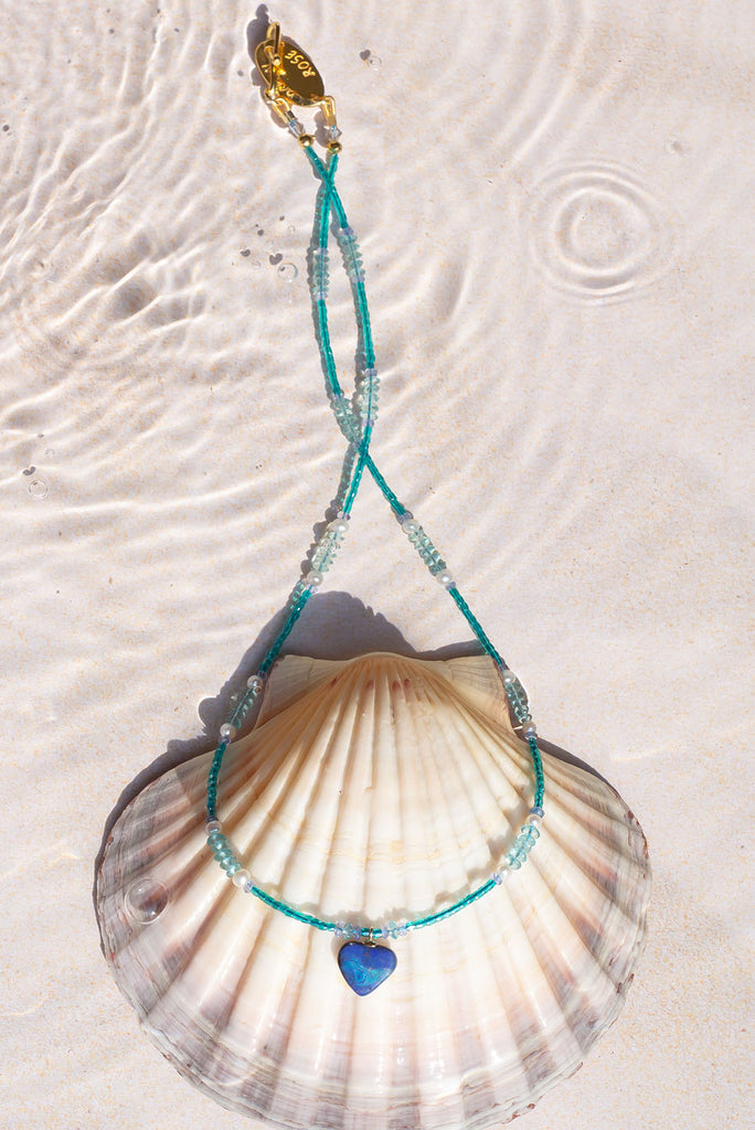 Discover the cool calming colours of this delicate and softly shimmering necklace.