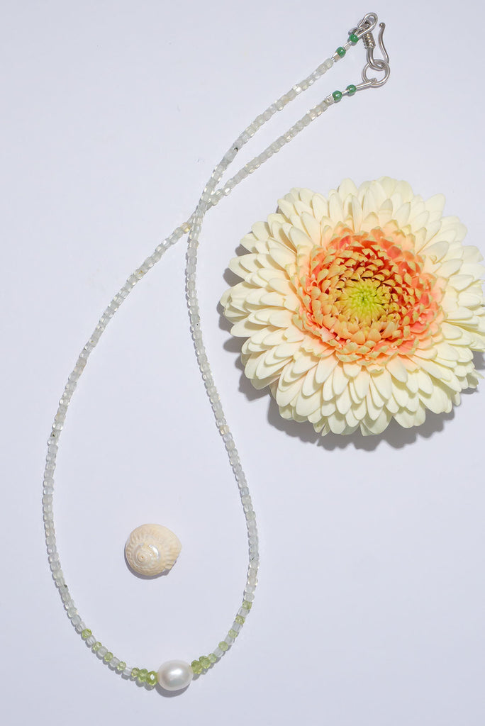 Beautiful gemstones in the softest shades of green and a gorgeous shimmering pearl.
