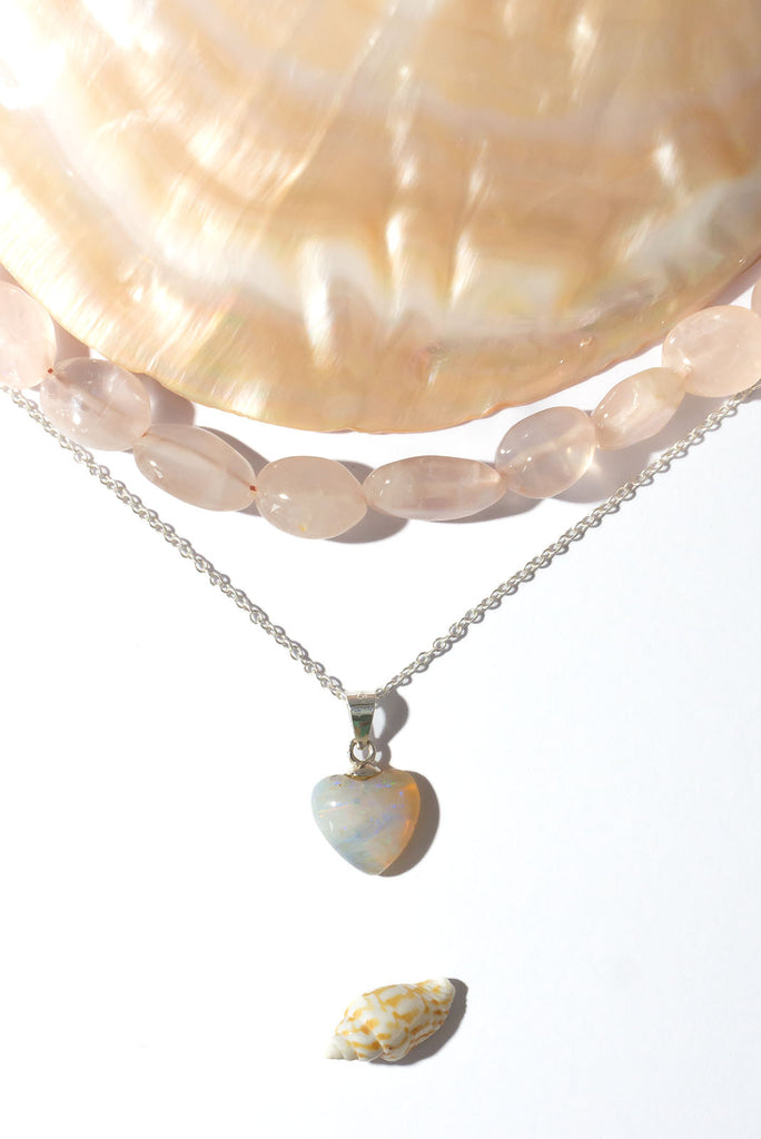 This delicate Australian Opal heart sparkles with a rainbow of colour play.&nbsp;