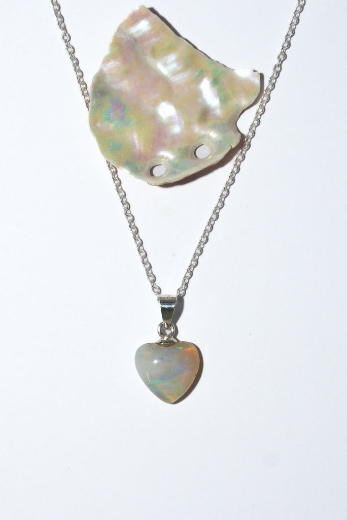 This delicate Australian Opal heart sparkles with a rainbow of colour play.