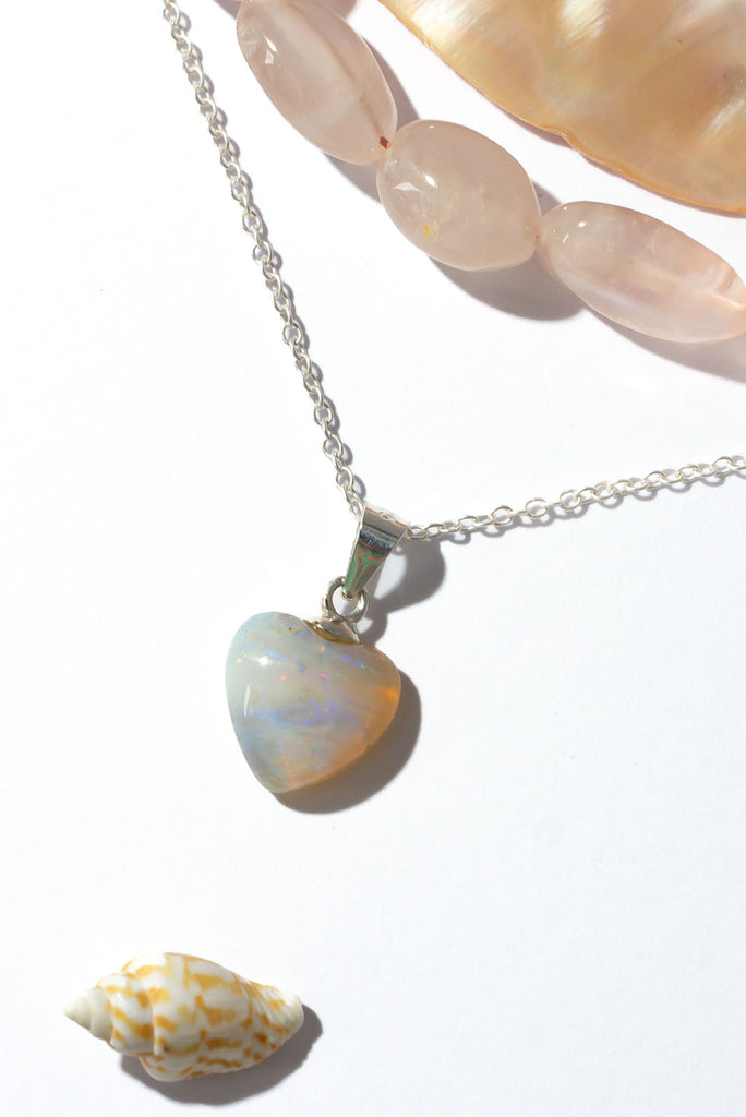 This delicate Australian Opal heart sparkles with a rainbow of colour play.&nbsp;