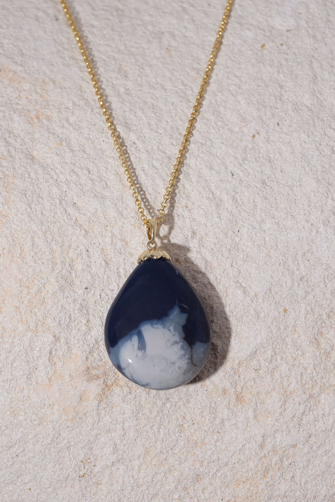Like a distant galaxy shimmering at the edge of the universe this gorgeous opal will enthral you. With 2 distinct bands of different fire and pattern this is a truly exception piece.