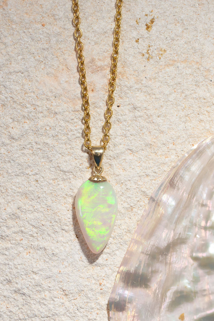 A flash of green as it dances across the sky, there is a bright luminous rolling flash of green in this enthralling opal pendant is absolutely unique, its even more beautiful in the sunshine.
