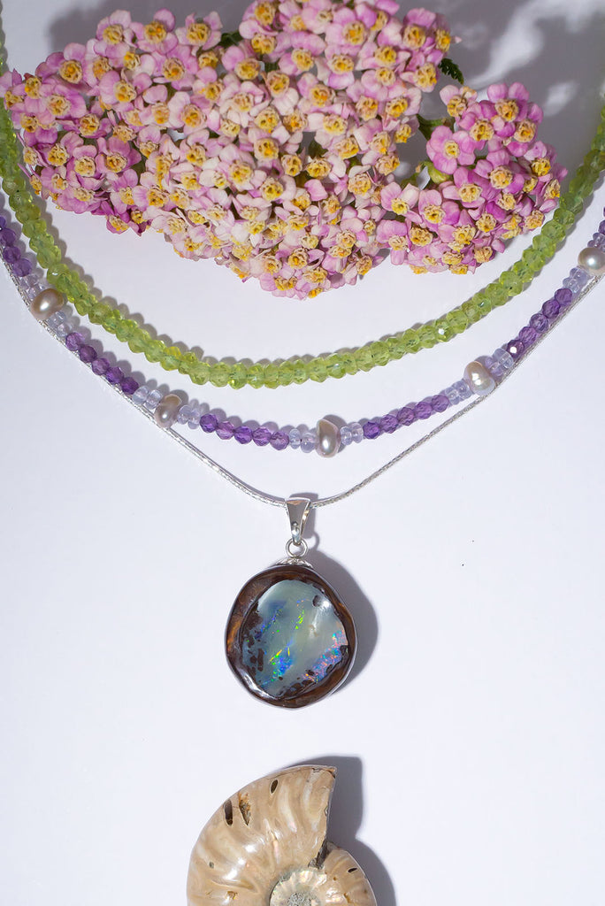 Discover a shimmering rainbow of colours in this magical Australian Boulder Opal piece.