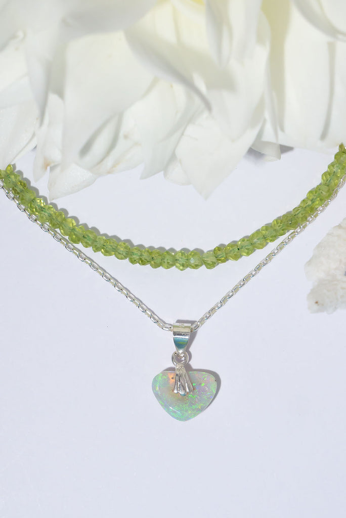This sparkling Australian Opal heart shimmers in the sunlight with beautiful dancing flecks of blue & green.