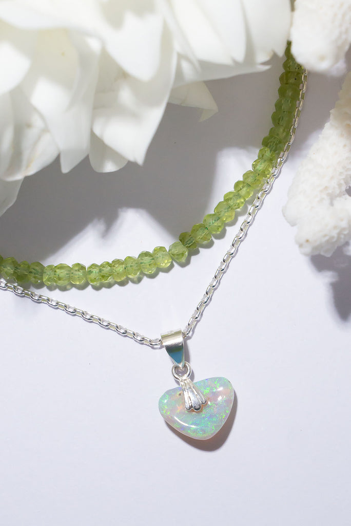 This sparkling Australian Opal heart shimmers in the sunlight with beautiful dancing flecks of blue & green.