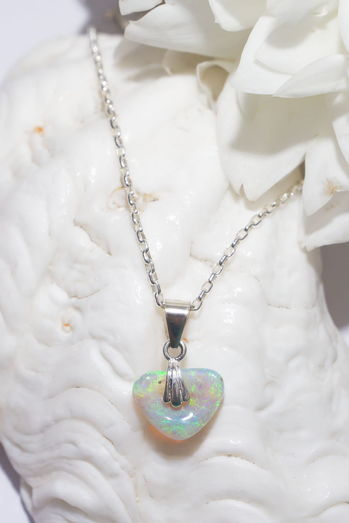This sparkling Australian Opal heart shimmers in the sunlight with beautiful dancing flecks of blue & green.