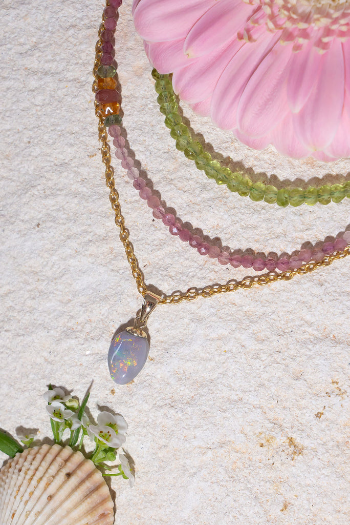This gorgeous Australian Opal is awash with a rainbow of shimmering colours.