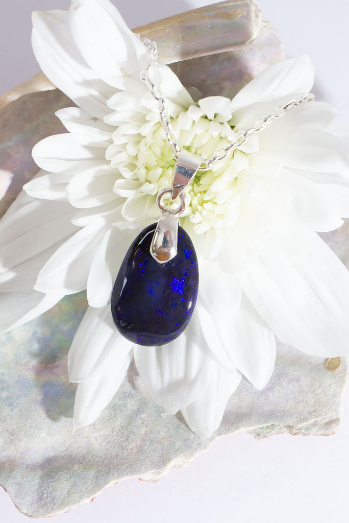 Get lost in the enthralling midnight blue hues of this magical Australian Opal pendant.