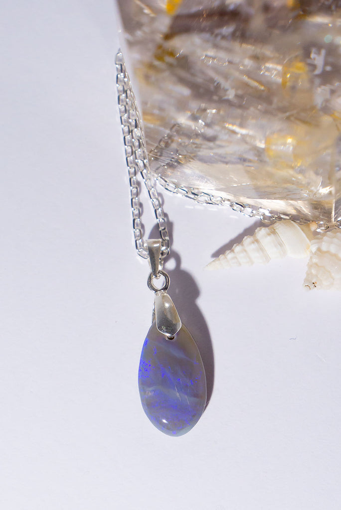 This opal pendant is as soft and pretty as a mist from the ocean with soft blue and mauve colours.