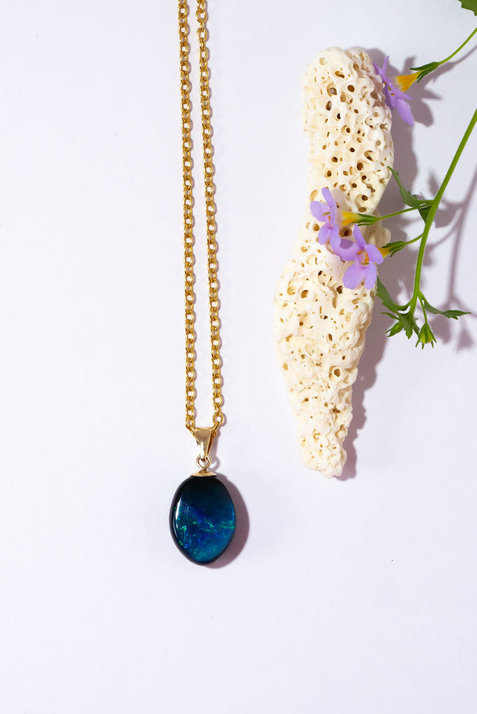 This exceptional and unique opal is both captivating in its design as well as its intense colours. Inspired by Nazare Reef this beautiful opal features swirls of blue, green and aqua.