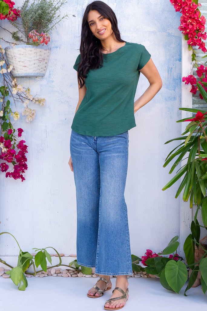 The Phoenix Tee Forest Green is a gorgeous deep green coloured t-shirt, featuring a classic t-shirt cut, curved hem and loose fit. Made from 100% knit cotton.