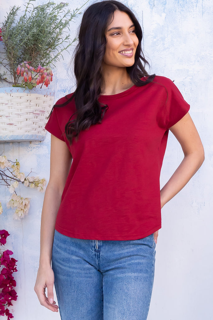 The Phoenix Tee Red Berries is a gorgeous deep red coloured t-shirt, featuring a classic t-shirt cut, curved hem and loose fit. Made from 100% knit cotton.
