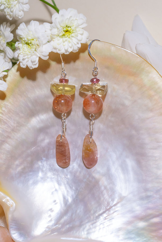 Fiery Tourmaline Sunset Fire Earrings featuring rhodolite garnet, heliodor, natural sunstone, and peachy pink tourmaline. Handmade nature-inspired jewelry crafted in Brisbane by Ocean Rose Jewels.