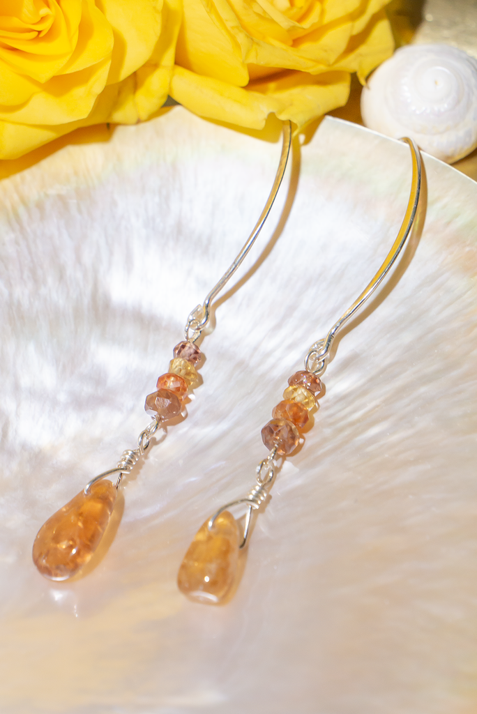 Luxurious Tourmaline Golden Droplet Earrings showcasing rhodolite garnet, sapphires, and golden tourmaline. Handcrafted in Brisbane, by Ocean Rose Jewels, adorned with sterling silver findings.