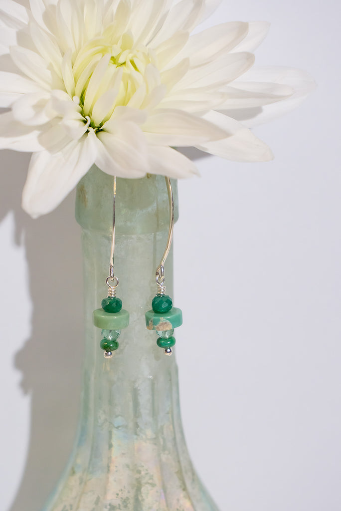 Dive into the playful Turquoise Green Seas Stack Earrings, where emerald, turquoise, prasiolite, and Sonoran gold form a lively stack. A vibrant ensemble capturing the spirit of green seas in motion.