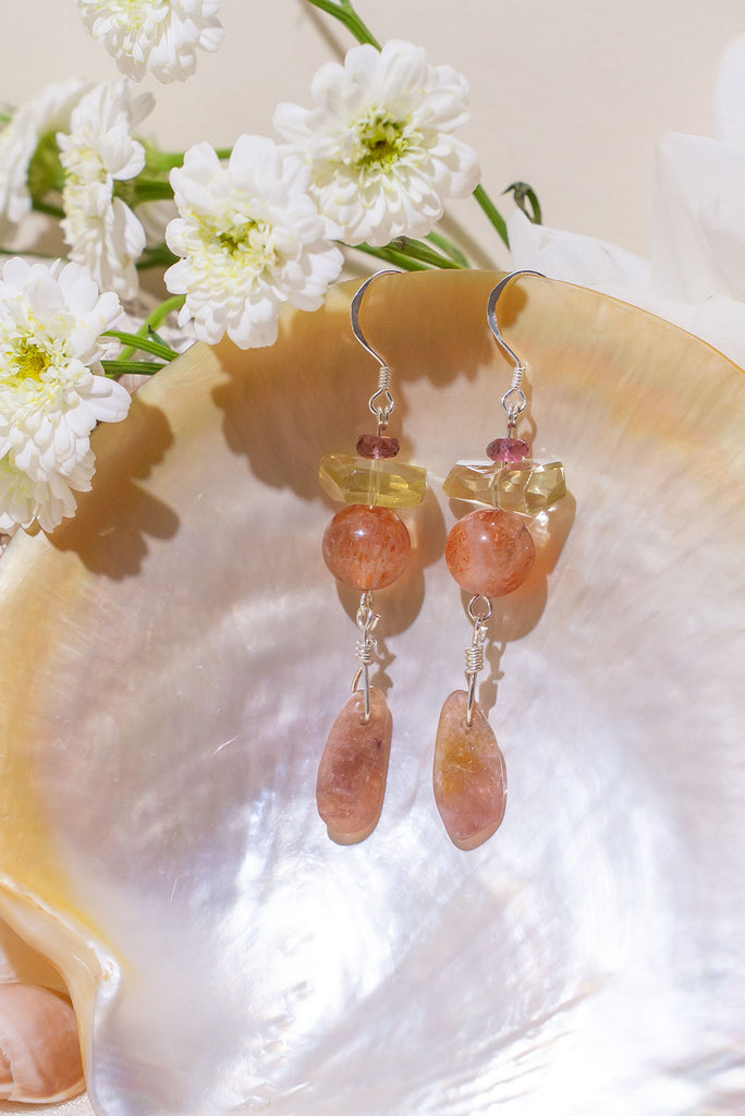 Fiery Tourmaline Sunset Fire Earrings featuring rhodolite garnet, heliodor, natural sunstone, and peachy pink tourmaline. Handmade nature-inspired jewelry crafted in Brisbane by Ocean Rose Jewels.