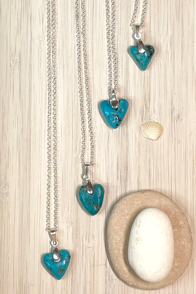 This lovely old turquoise pendant is a one off piece, hand carved into a rough heart shape 