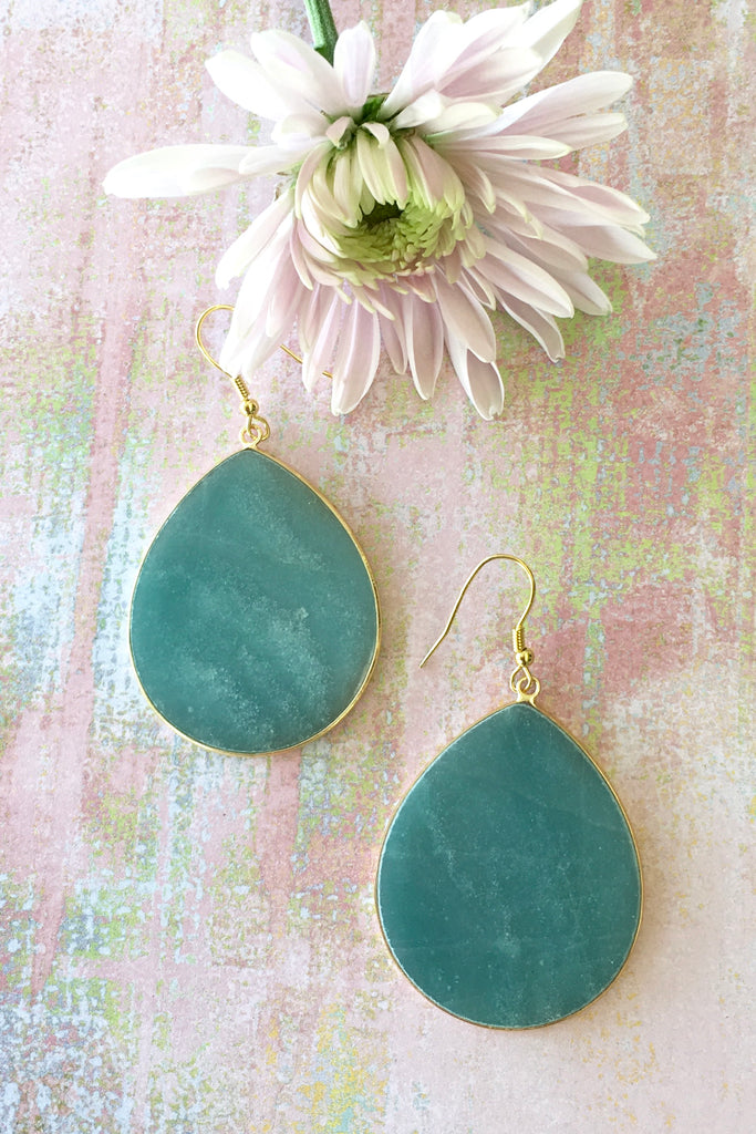 Women's Jewellery and Accessories. Earrings Stone Leaf Teal are Statement teal drop earrings. Raw natural stone. Gold hardware. Large and eye catching. Great gift or occasion wear.