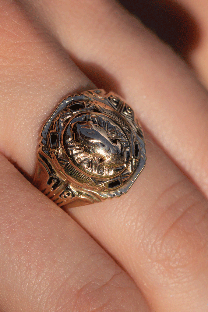 Vintage university ring with the date 1952, a raised crest of a flame centrepiece