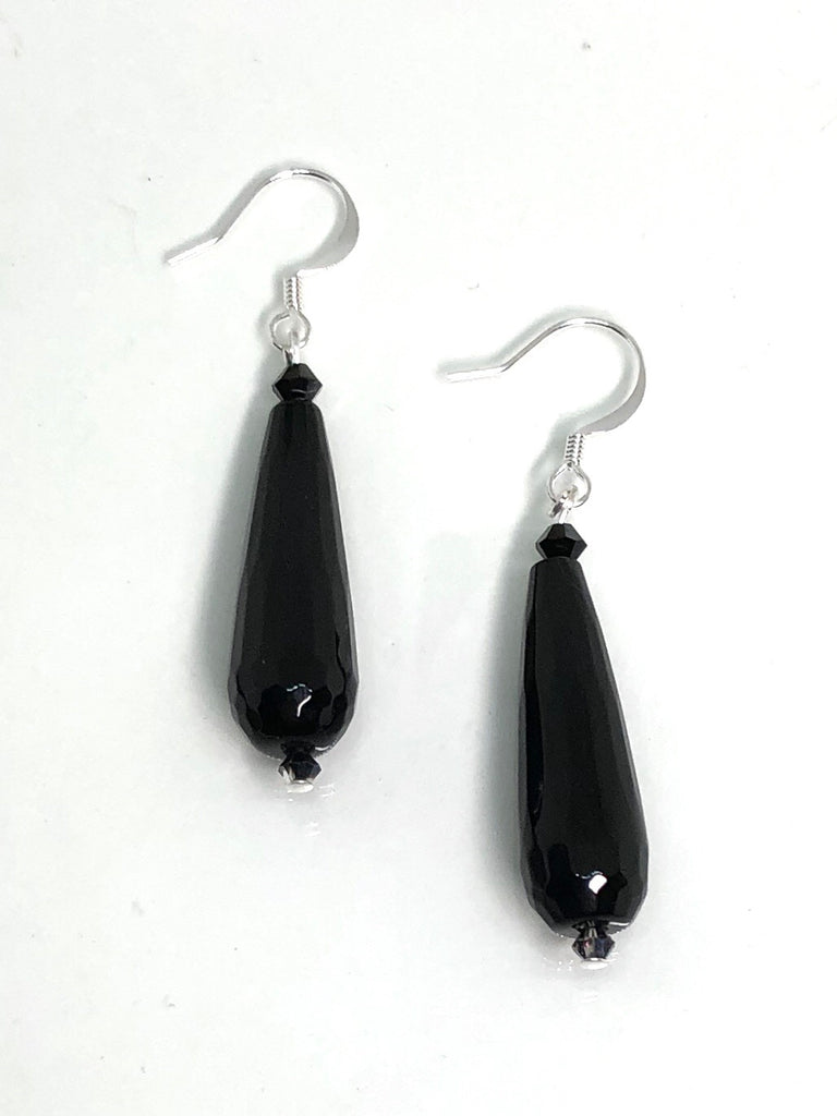 teardrop style statement earrings are made from natural stone 