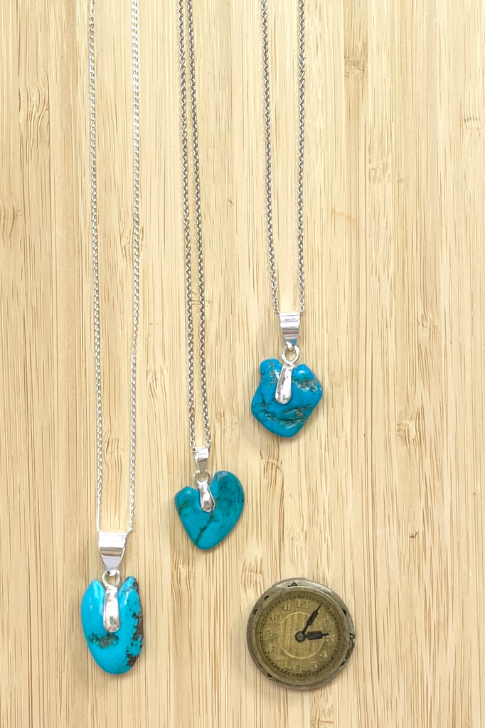 This lovely old turquoise pendant is a one off piece, hand carved into a rough heart shape