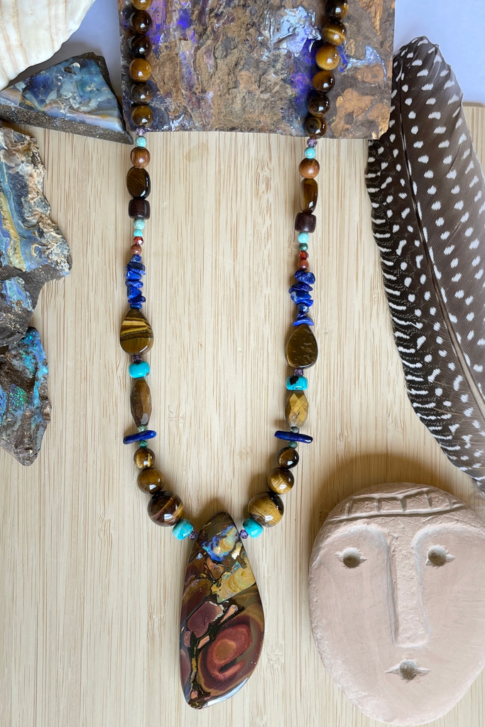 This necklace has been designed using natural Opal and many different semi precious gemstones